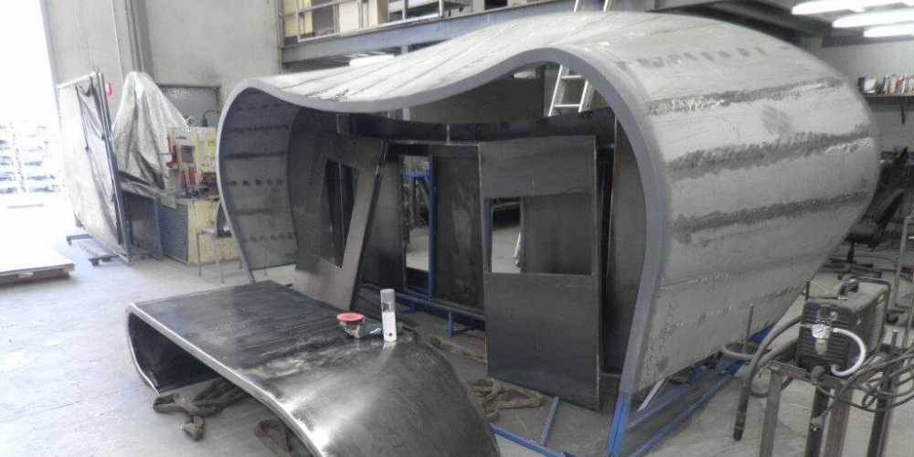 Curved industrial metal in a workshop