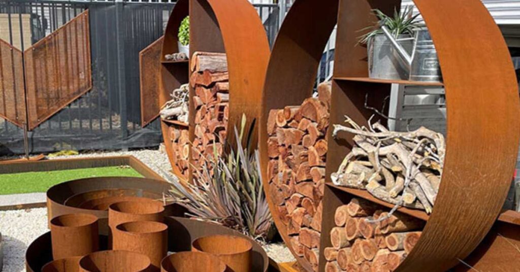 Corten steel wood stacker with chop woods