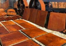 Rusty metal sheets and panels in an outdoor industrial area
